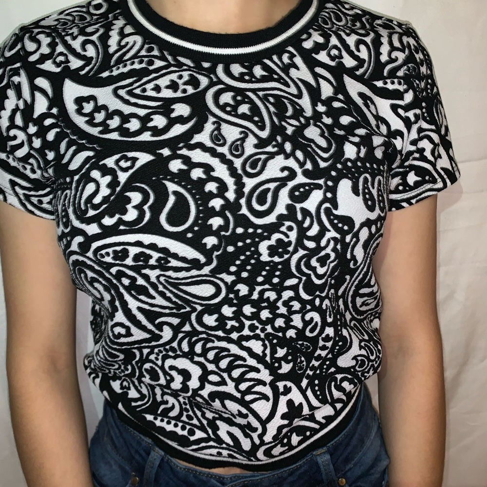 White and black crop top.